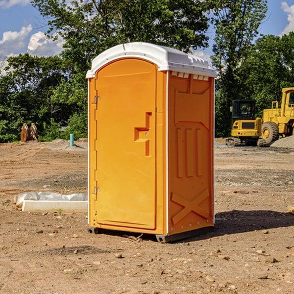 how often are the porta potties cleaned and serviced during a rental period in Breda